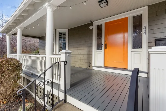 a view of a house with wooden floor and iron stairs
