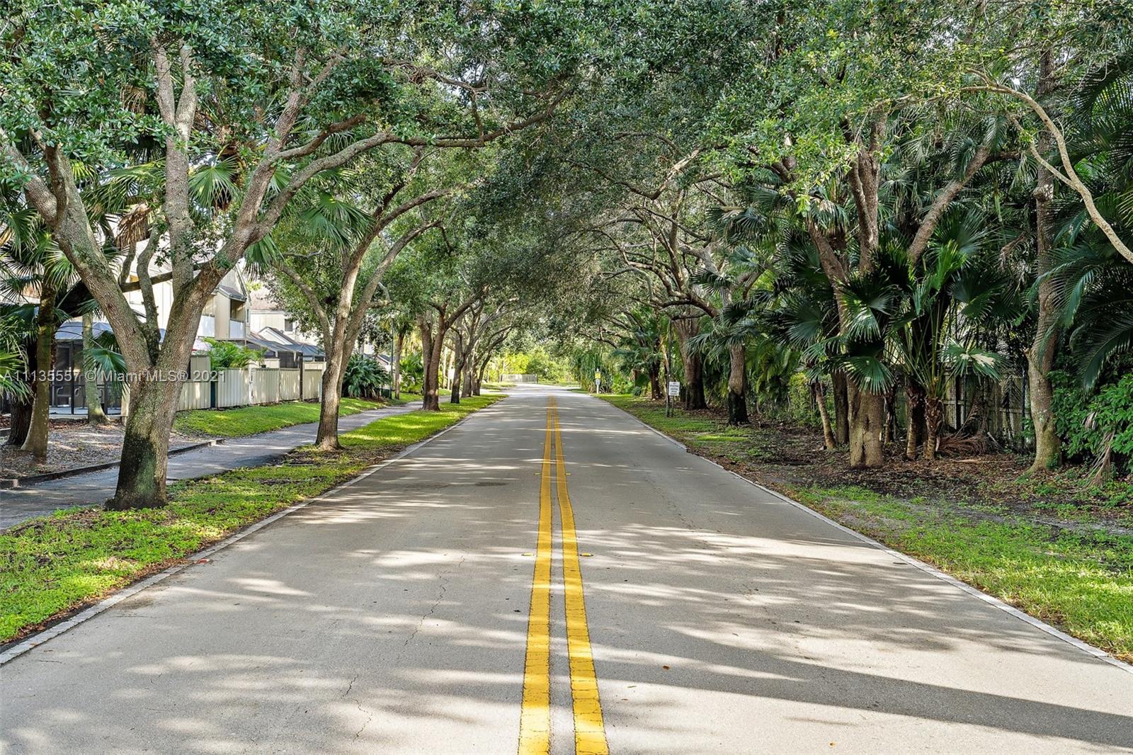 6351 Riverwalk Lane, Unit 4 Jupiter, FL 33458 - Photo 34 of 46 a view of a yard with plants and trees