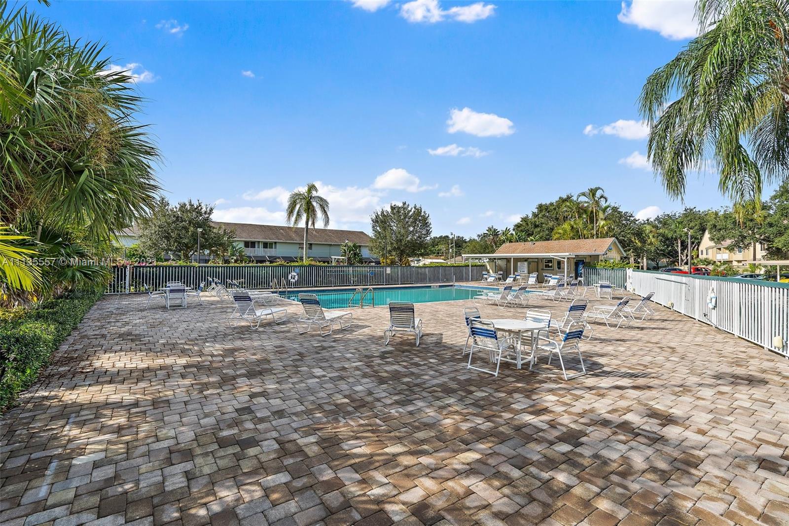 6351 Riverwalk Lane, Unit 4 Jupiter, FL 33458 - Photo 41 of 46 a view of a lake with a yard