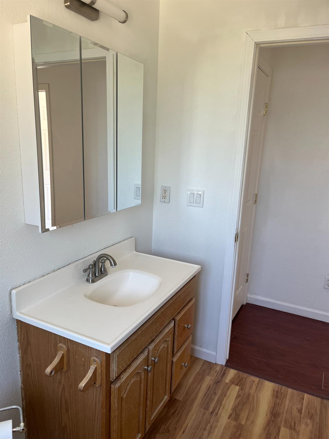 16164 Nugget Road Corning, CA 96021 - Photo 10 of 17 a bathroom with a sink and a mirror