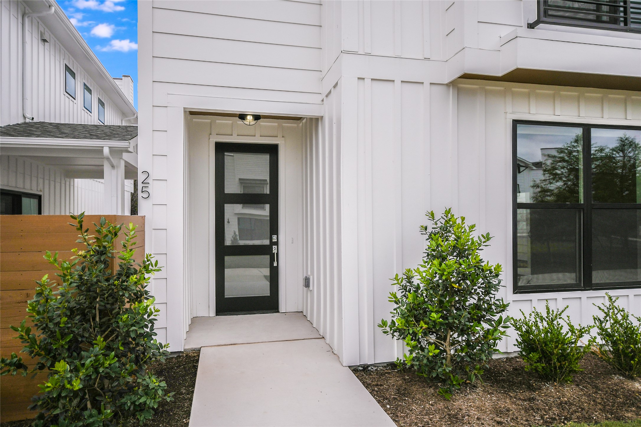 a front view of a house with a garage