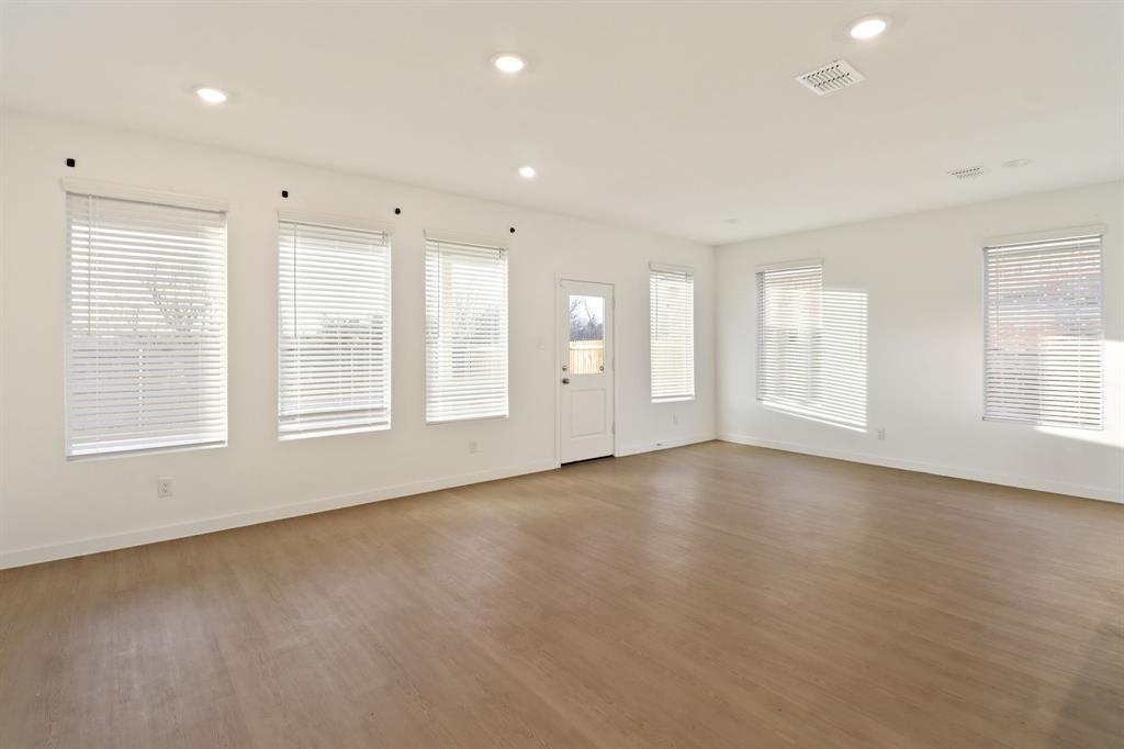 1016 Flameleaf Drive Princeton, TX 75407 - Photo 11 of 32 a view of an empty room with a window