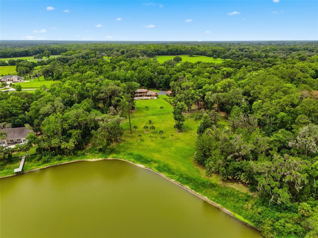 855 Southeast 87th Street Ocala, FL 34480 - Photo 79 of 79 a view of an outdoor space and a lake view