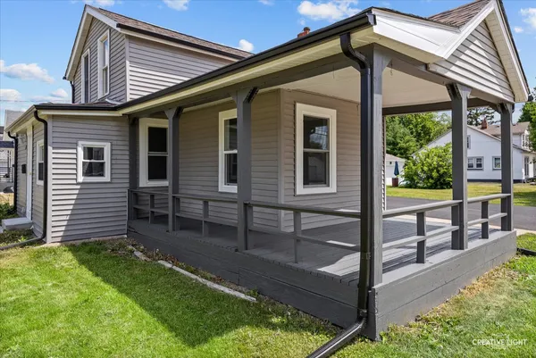 a front view of a house with porch