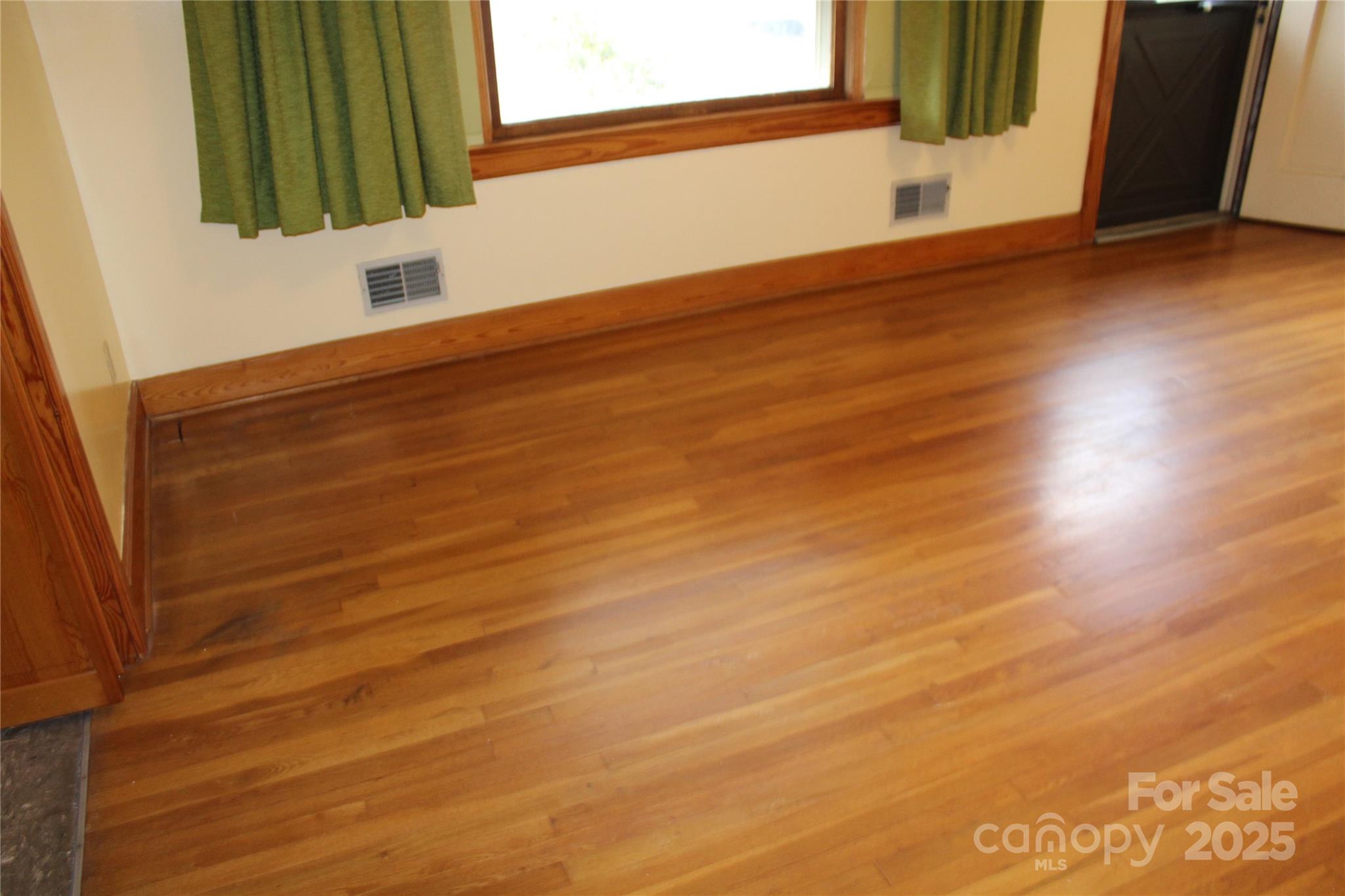 1761 Dearborn Street Morganton, NC 28655 - Photo 11 of 34 a view of a small space with wooden floor and a window