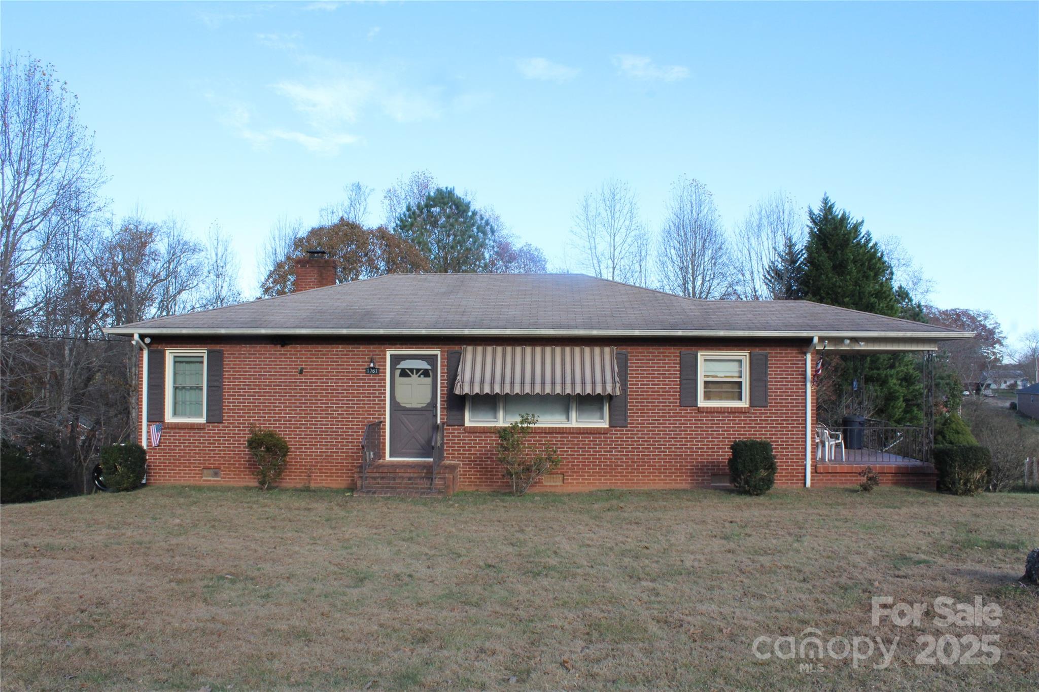 1761 Dearborn Street Morganton, NC 28655 - Photo 2 of 34 a front view of a house with a yard