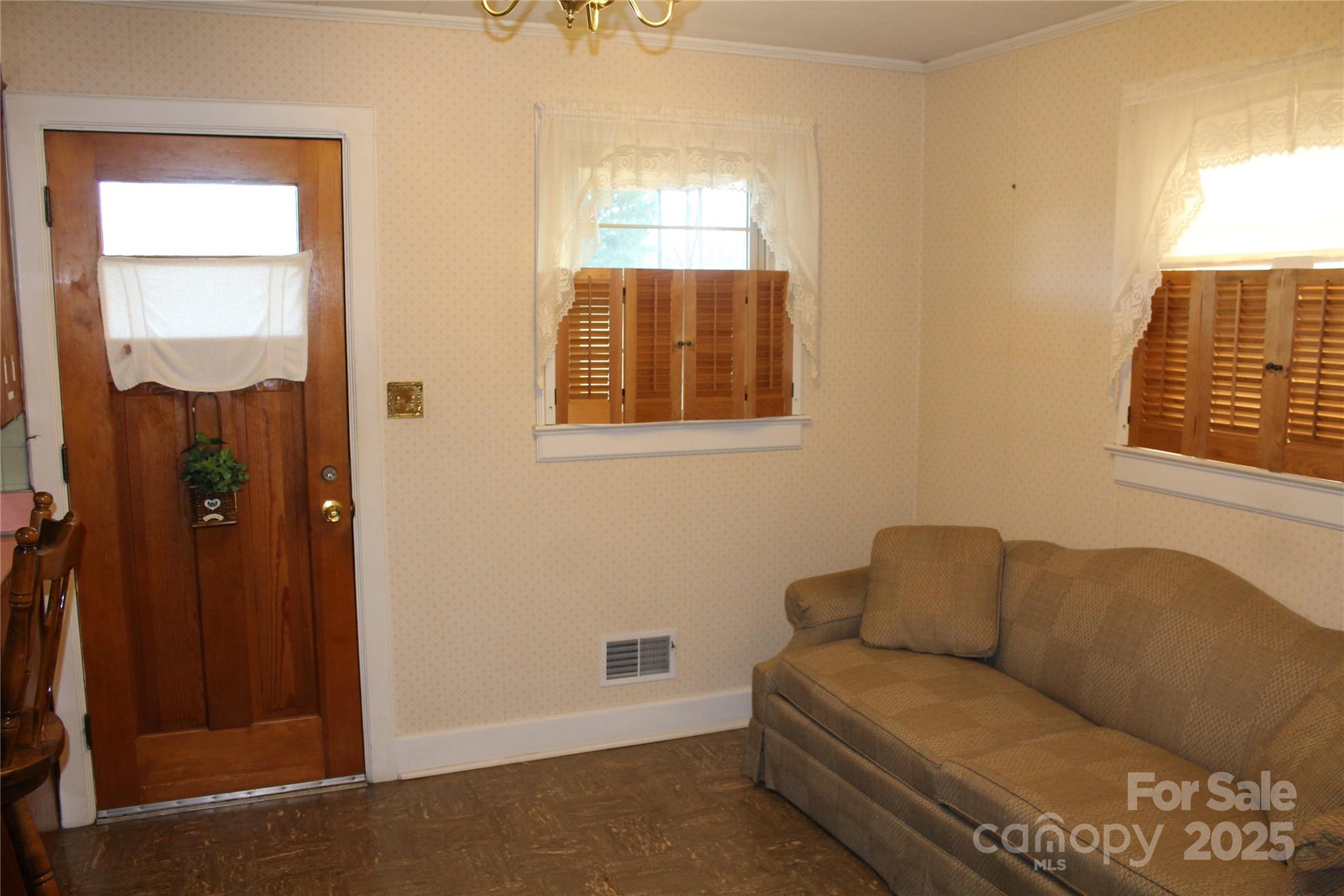 1761 Dearborn Street Morganton, NC 28655 - Photo 22 of 34 a living room with furniture and a window