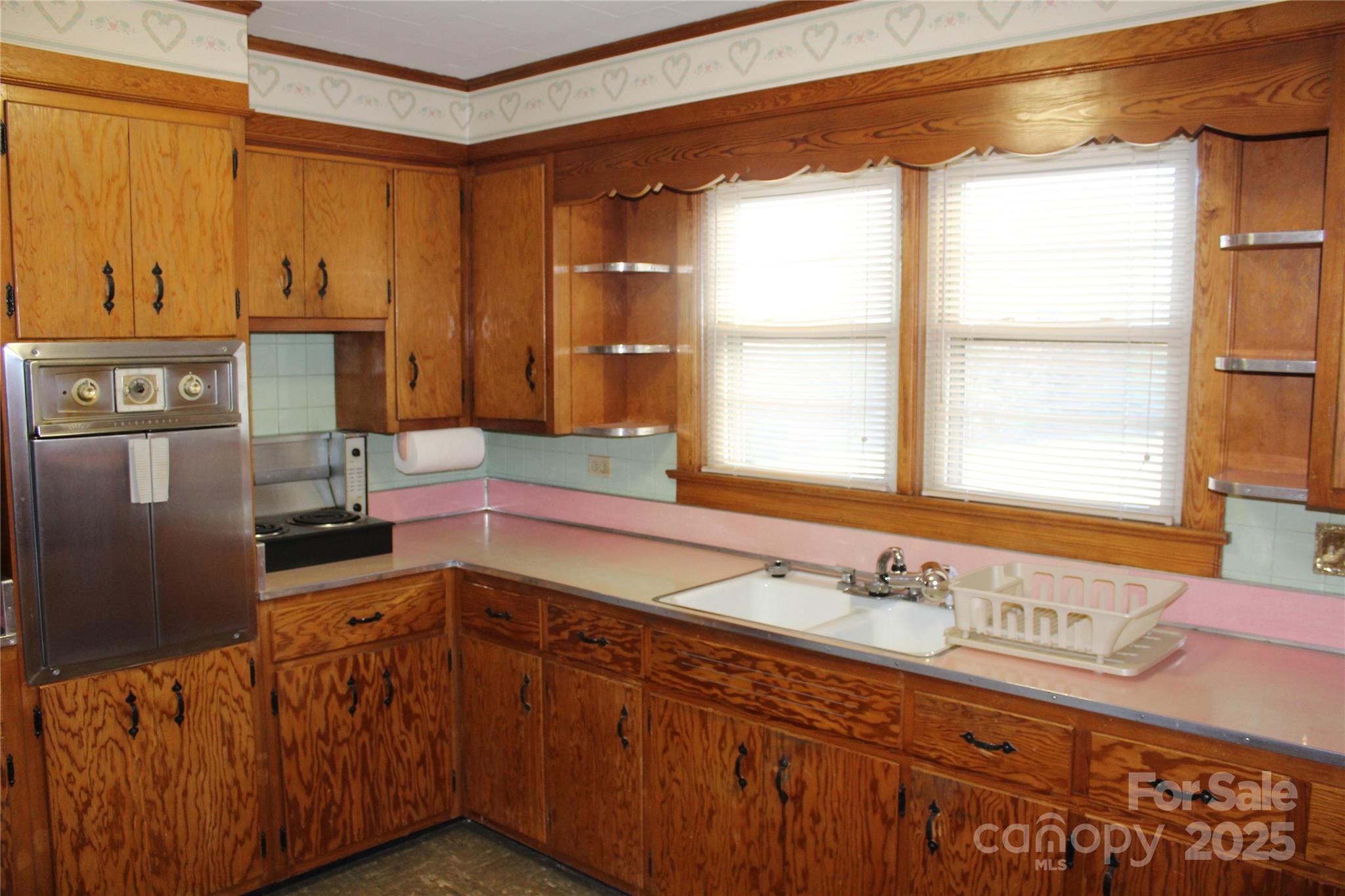 1761 Dearborn Street Morganton, NC 28655 - Photo 27 of 34 a bathroom with a sink and a window