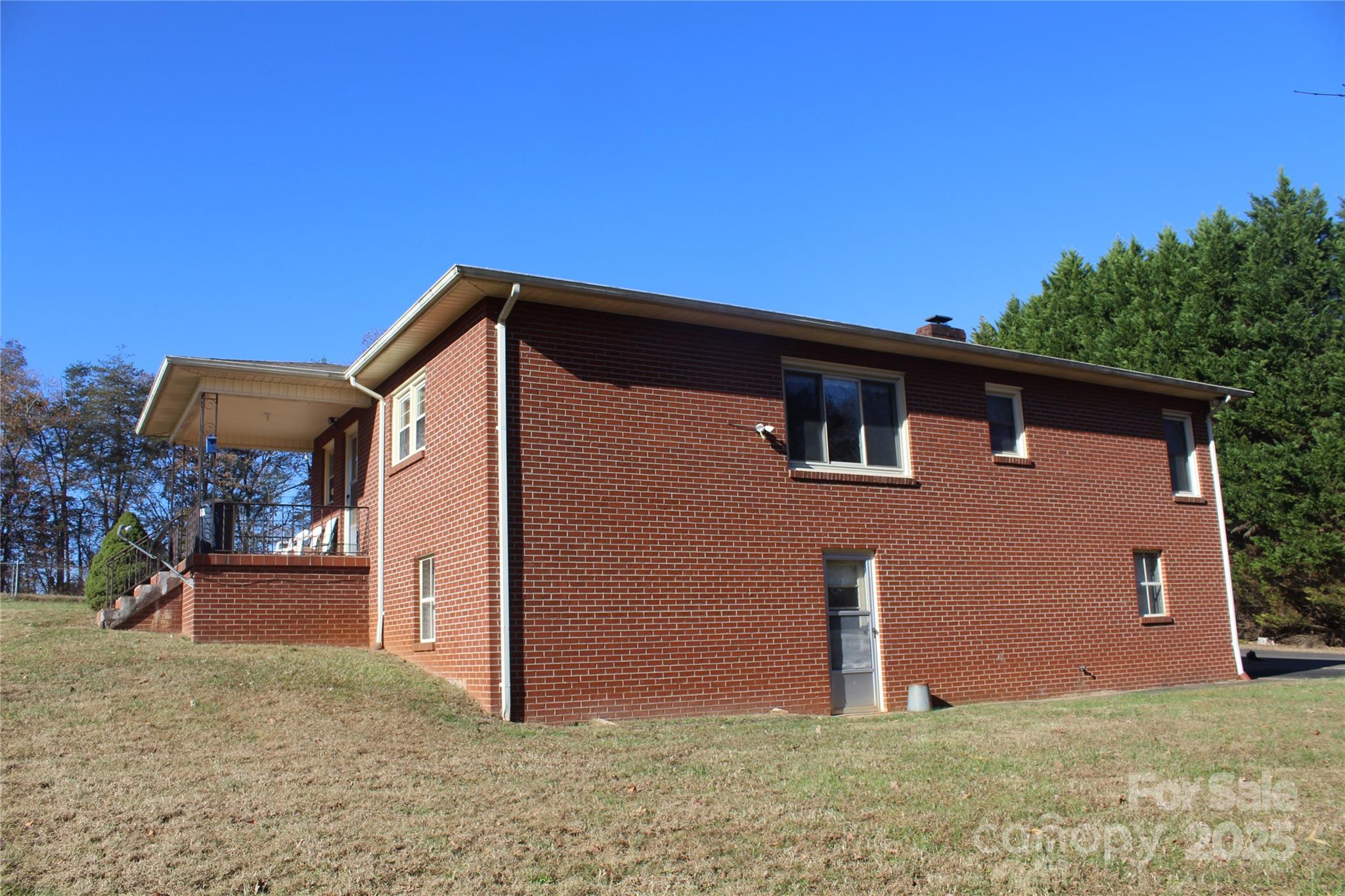1761 Dearborn Street Morganton, NC 28655 - Photo 4 of 34 a front view of a house with a yard