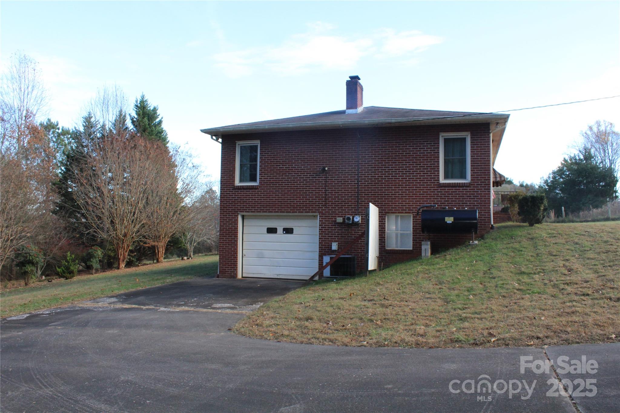 1761 Dearborn Street Morganton, NC 28655 - Photo 6 of 34 a front view of a house with a yard