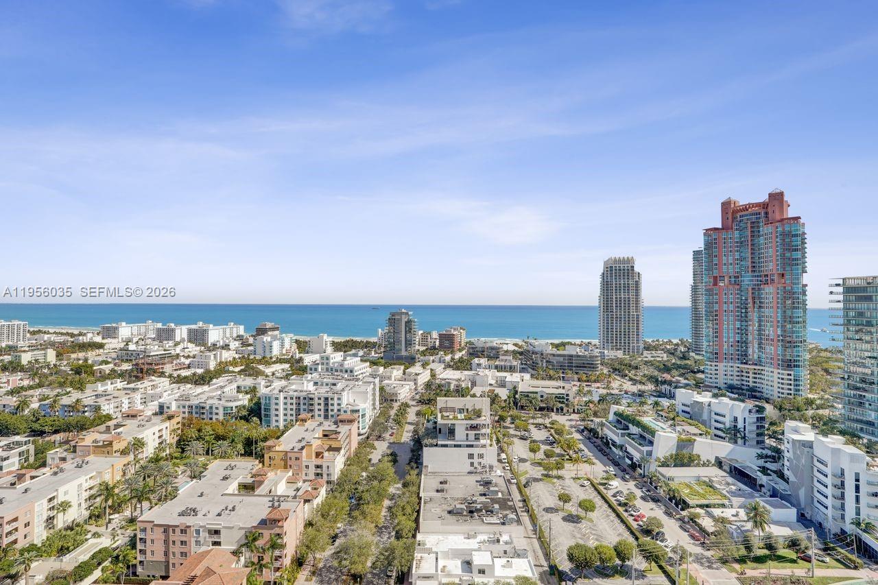 90 Alton Road, Unit 2701 Miami Beach, FL 33139 - Photo 9 of 76 an aerial view of city and lake