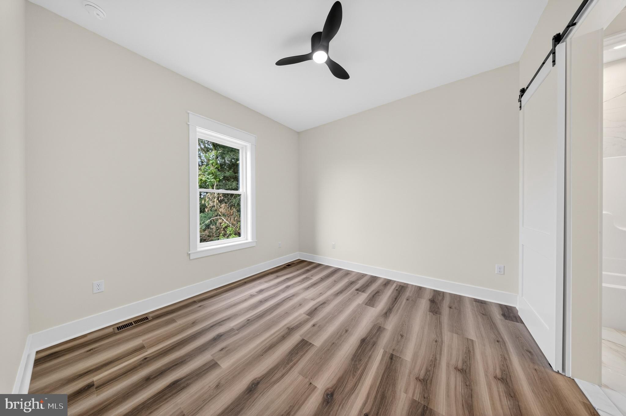 14133 Pepperbox Road Delmar, DE 19940 - Photo 40 of 59 a view of room with window and ceiling fan