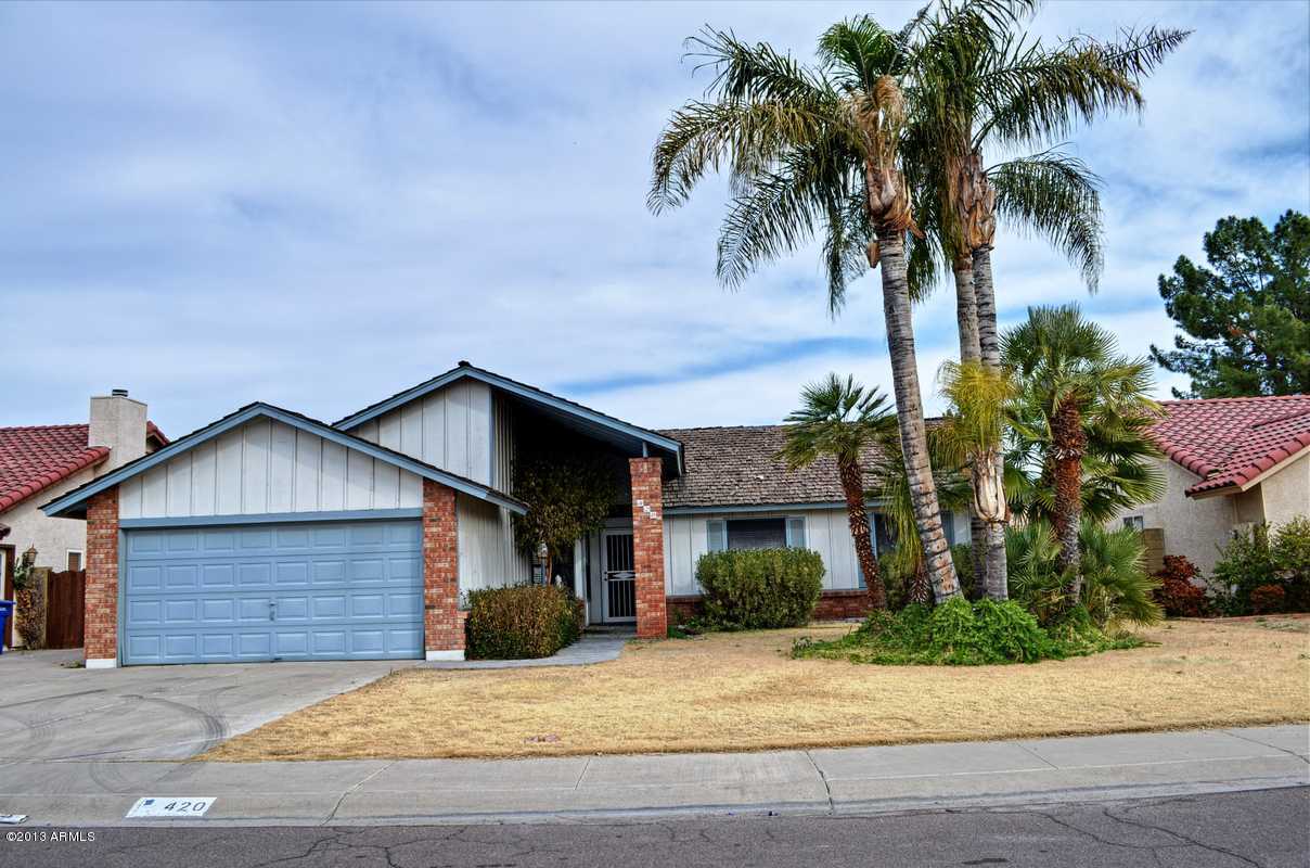 420 East Harwell Road Gilbert, AZ 85234 - Photo 1 of 13 a front view of house with yard and green space