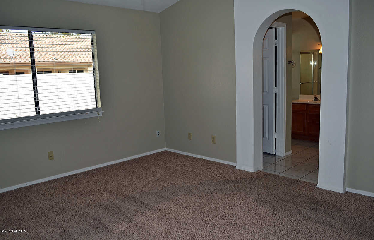 420 East Harwell Road Gilbert, AZ 85234 - Photo 8 of 13 an empty room with a window