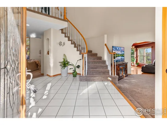a view of entryway with livingroom and furniture