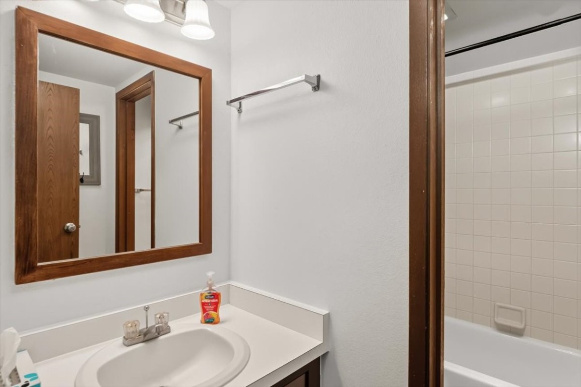 1937 Soda Ridge Road, Unit 1159 Keystone, CO 80435 - Photo 15 of 29 a bathroom with a sink and a mirror