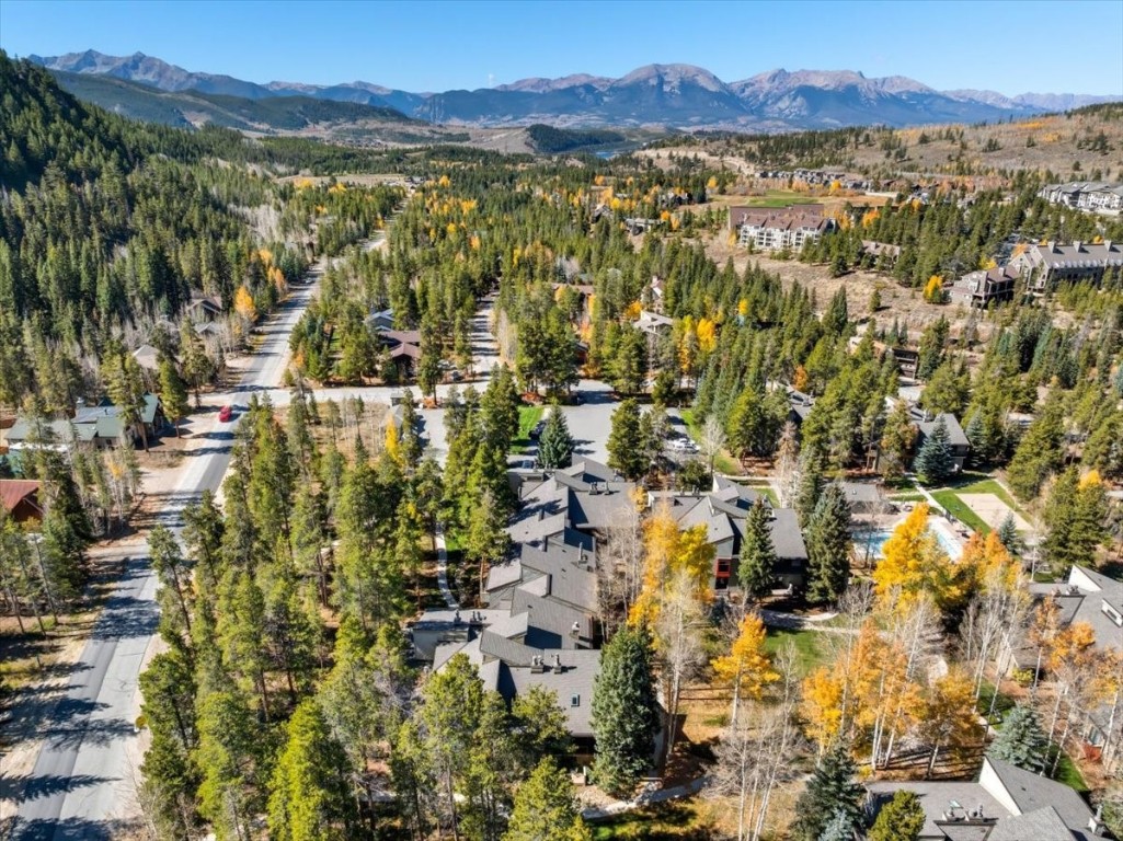 1937 Soda Ridge Road, Unit 1159 Keystone, CO 80435 - Photo 22 of 29 a view of a city with mountains in the background