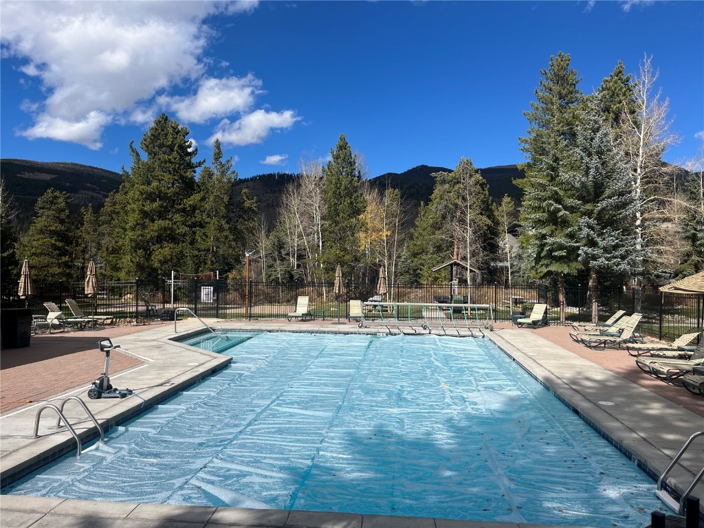 1937 Soda Ridge Road, Unit 1159 Keystone, CO 80435 - Photo 27 of 29 a view of a swimming pool with sitting area