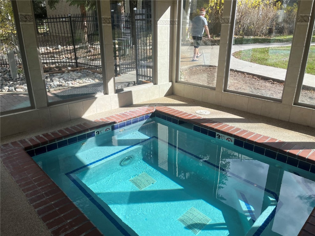 1937 Soda Ridge Road, Unit 1159 Keystone, CO 80435 - Photo 29 of 29 a room with pool table and windows