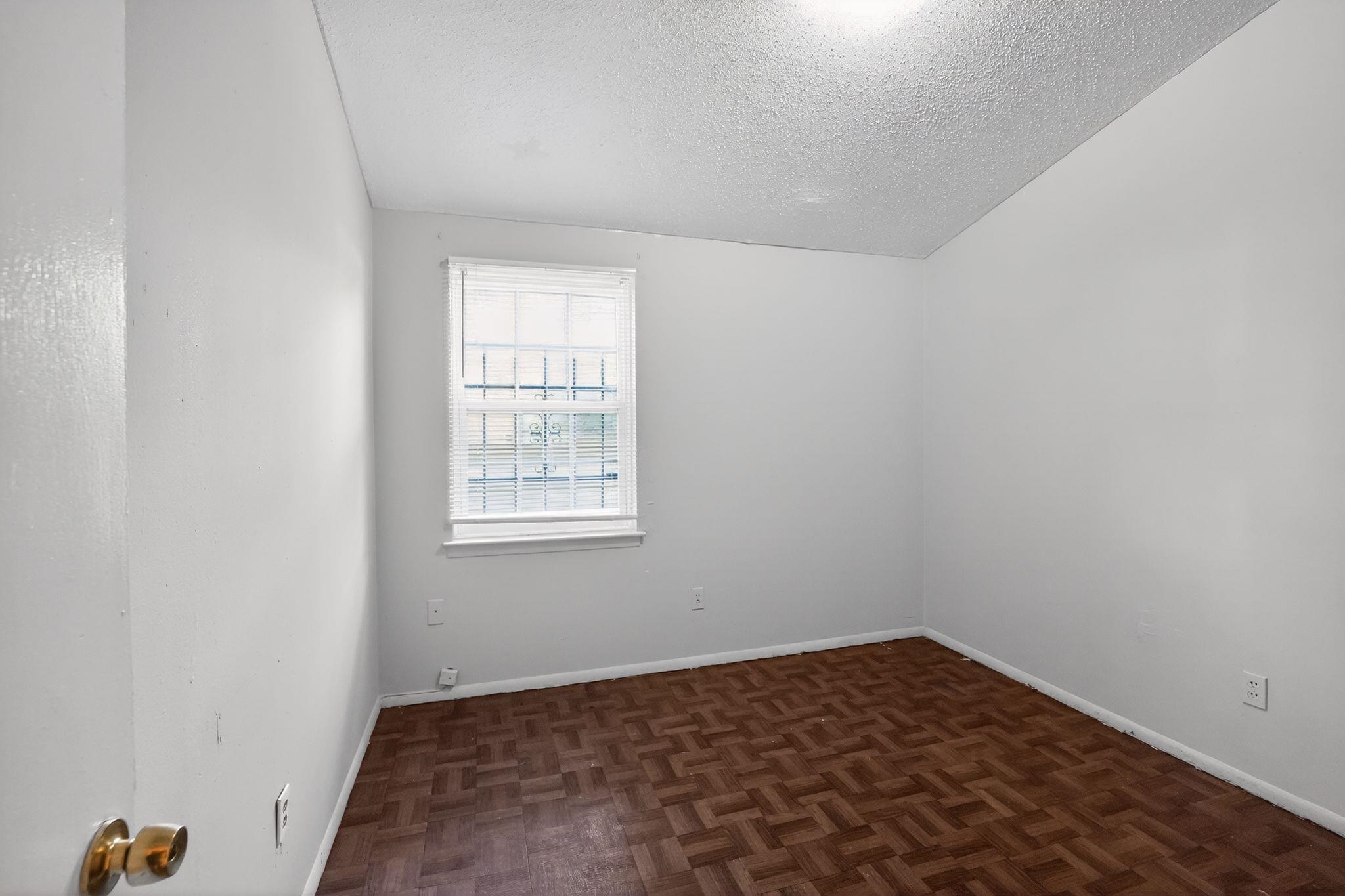 4504 Neely Road Memphis, TN 38109 - Photo 29 of 32 an empty room with a window
