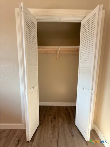 a large kitchen with cabinets