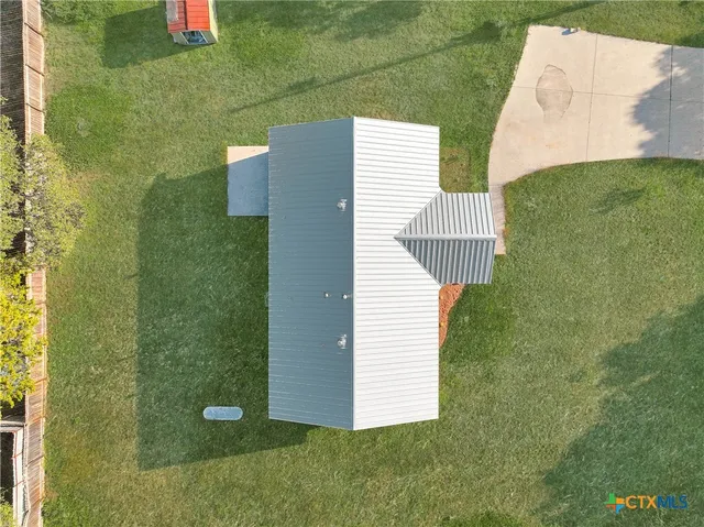 a view of a backyard with a garden