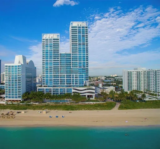 a view of a city with tall buildings