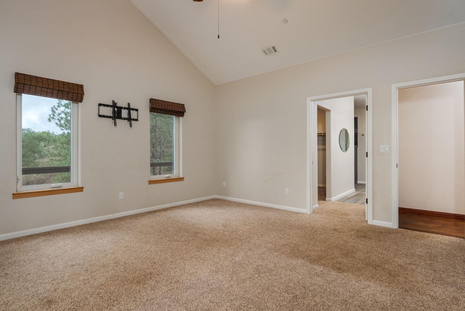 9080 El Dorado Trail Mountain Ranch, CA 95246 - Photo 26 of 48 a view of an empty room with a window