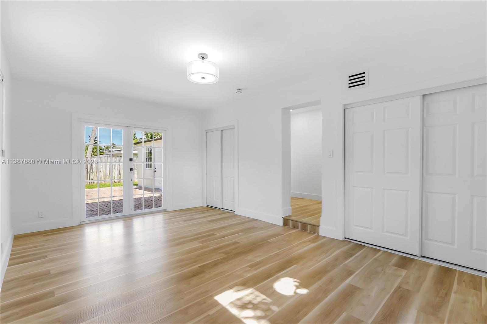 269 Northwest 12th Street Boca Raton, FL 33432 - Photo 12 of 18 a view of an empty room with window