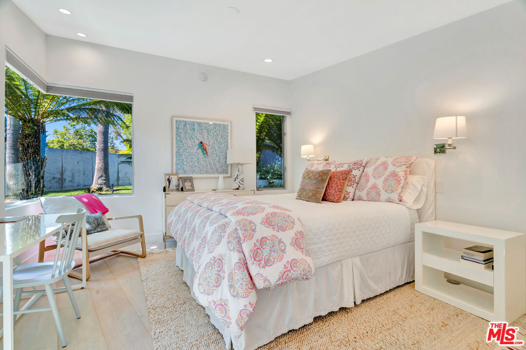 28775 Sea Ranch Way Malibu, CA 90265 - Photo 15 of 21 a bedroom with a bed and a dresser