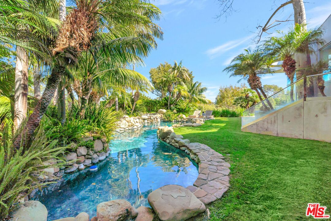 28775 Sea Ranch Way Malibu, CA 90265 - Photo 21 of 21 a view of a backyard with plants and a garden