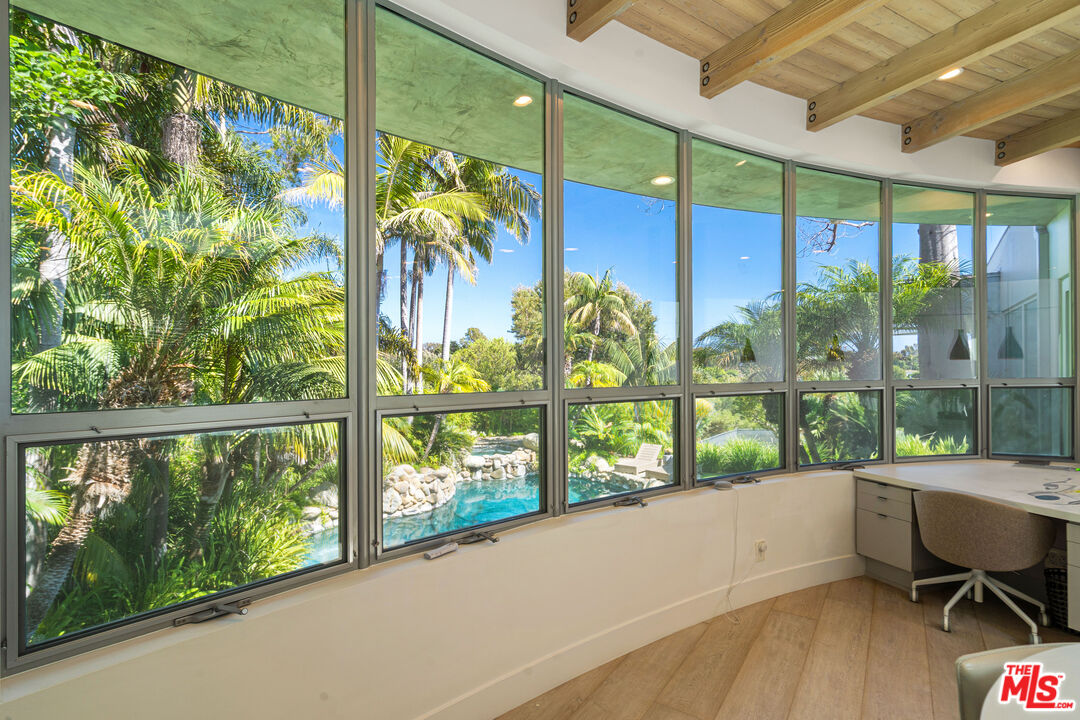 28775 Sea Ranch Way Malibu, CA 90265 - Photo 3 of 21 a view of a porch with furniture and garden