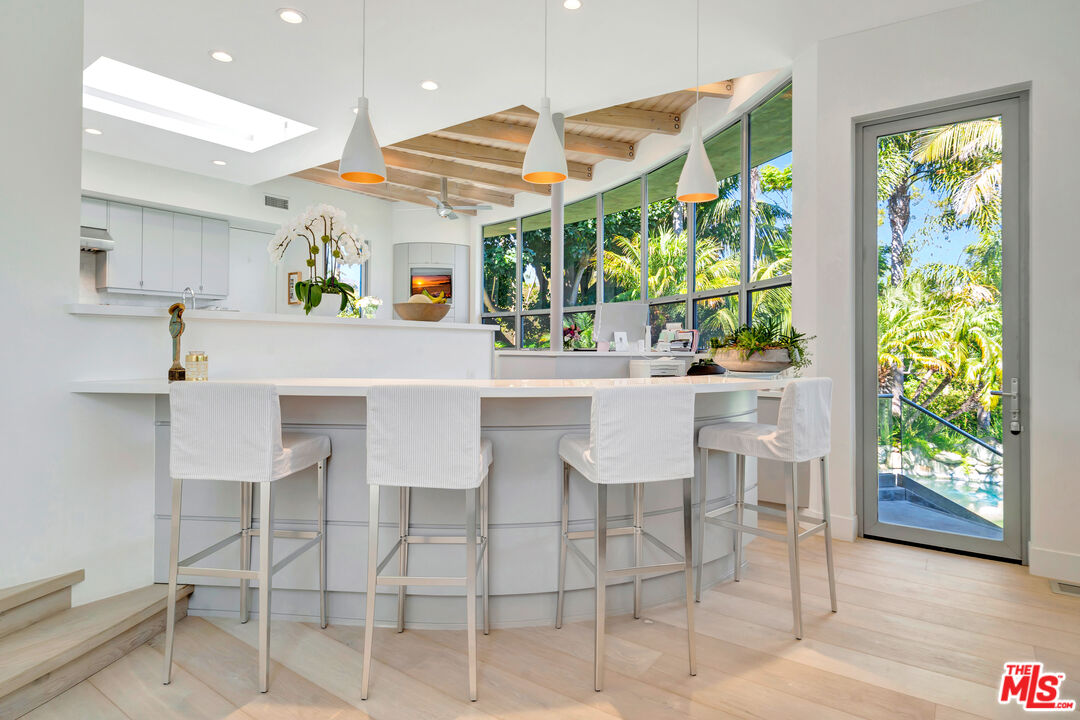 28775 Sea Ranch Way Malibu, CA 90265 - Photo 5 of 21 a dining room with furniture and a large window