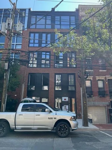 a car parked in front of a building