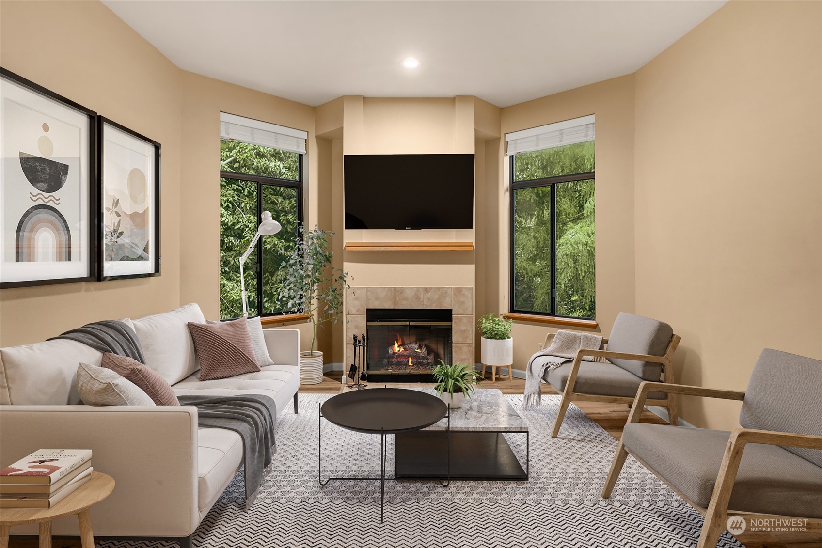 9009 Avondale Road Northeast, Unit R 235 Redmond, WA 98052 - Photo 1 of 24 a living room with furniture a flat screen tv and a fireplace