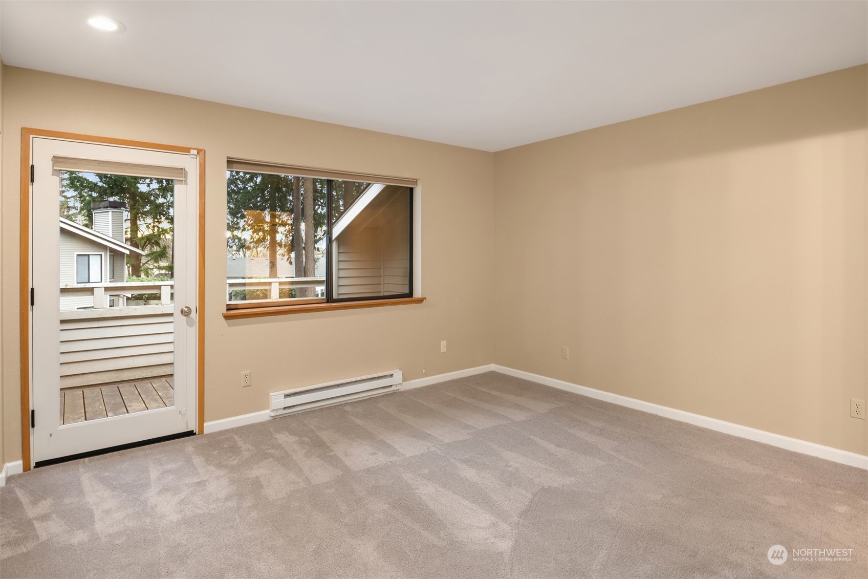 9009 Avondale Road Northeast, Unit R 235 Redmond, WA 98052 - Photo 15 of 24 an empty room with windows