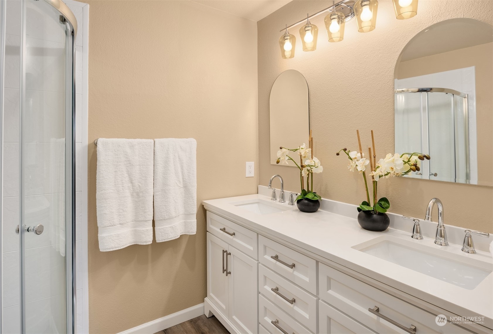 9009 Avondale Road Northeast, Unit R 235 Redmond, WA 98052 - Photo 18 of 24 a bathroom with a double vanity sink and a mirror