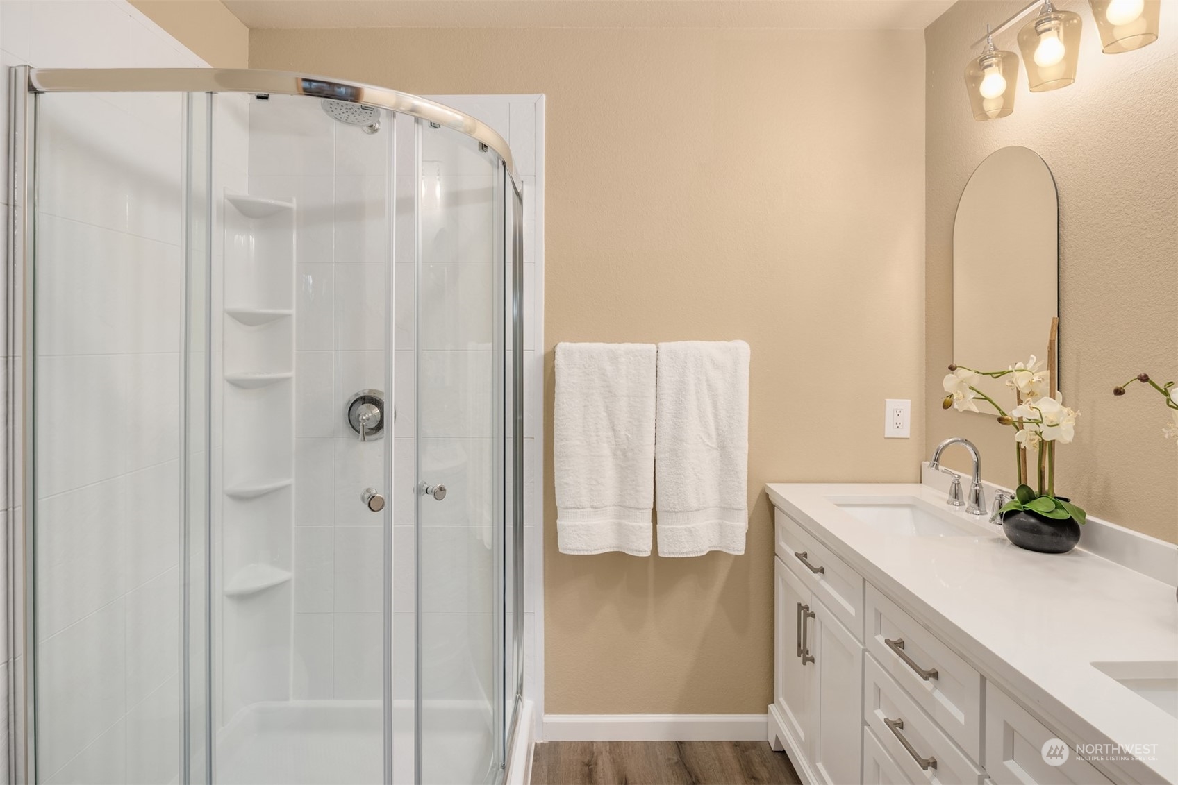 9009 Avondale Road Northeast, Unit R 235 Redmond, WA 98052 - Photo 19 of 24 a bathroom with a sink a double vanity and a mirror