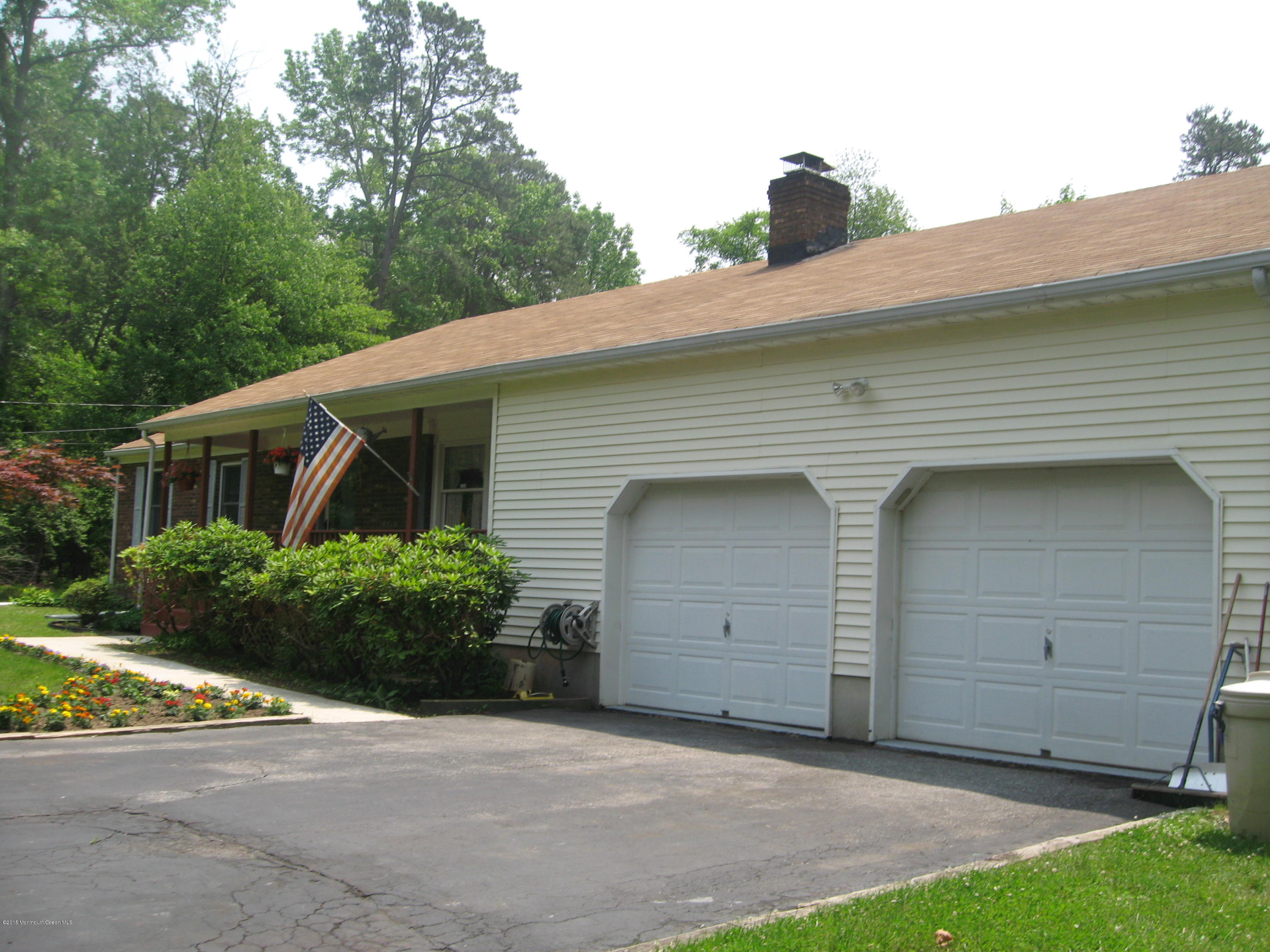 428 Oak Tree Road Freehold, NJ 07728 - Photo 17 of 18 a view of a house with a yard