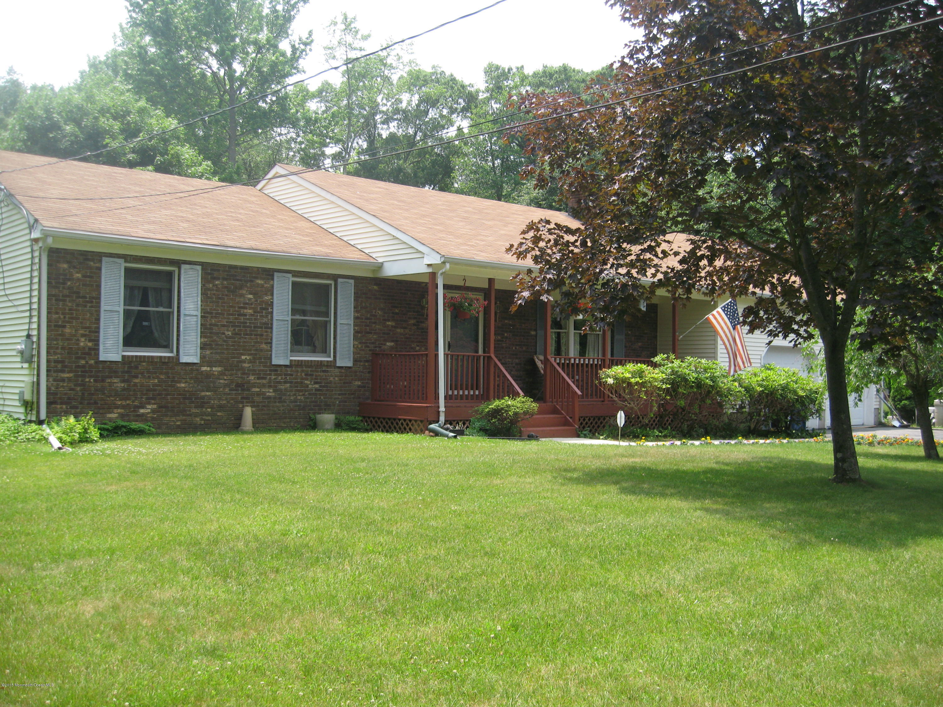 428 Oak Tree Road Freehold, NJ 07728 - Photo 2 of 18 a view of a house with a yard and a large tree