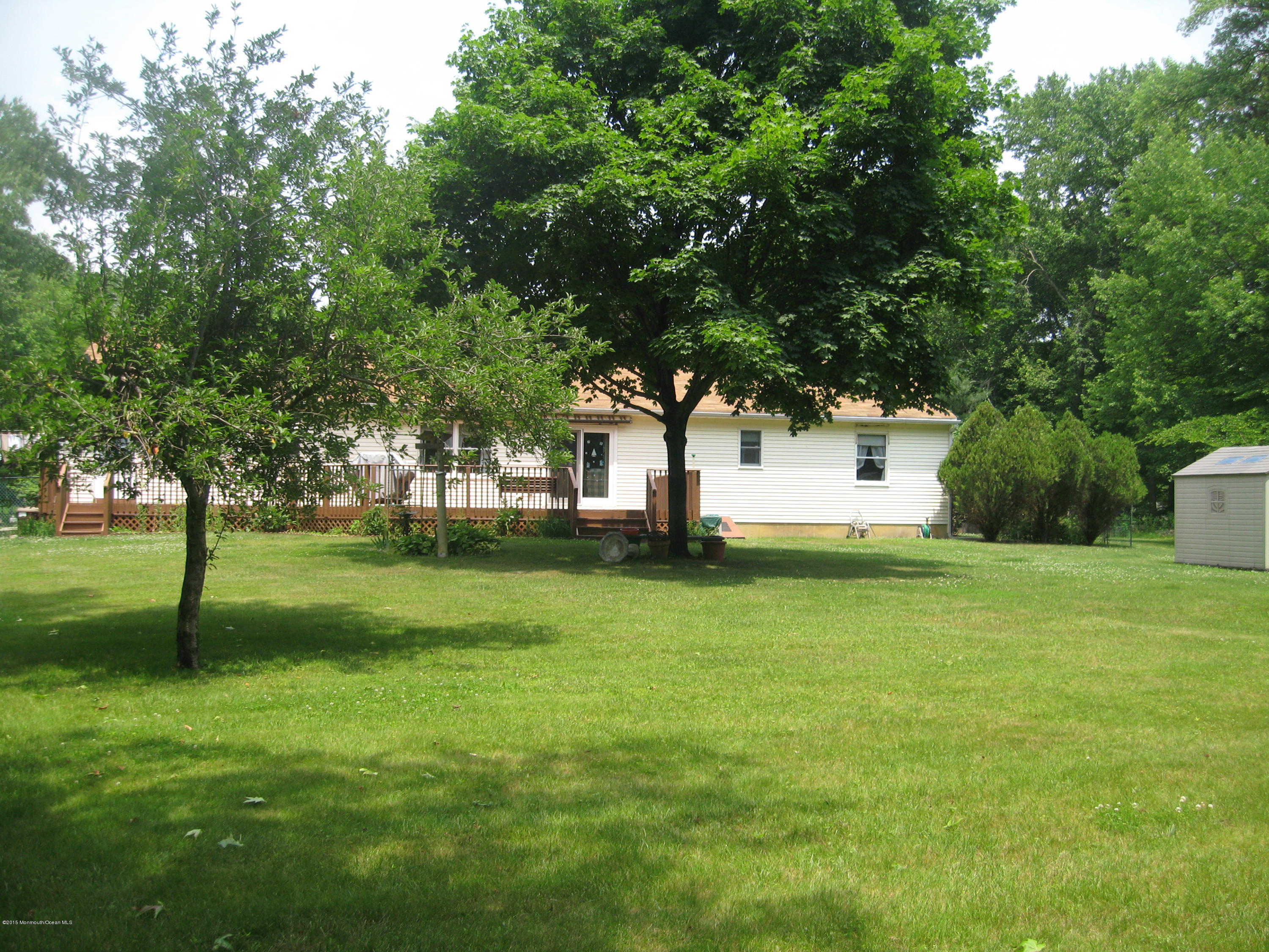 428 Oak Tree Road Freehold, NJ 07728 - Photo 4 of 18 a house view with a garden space