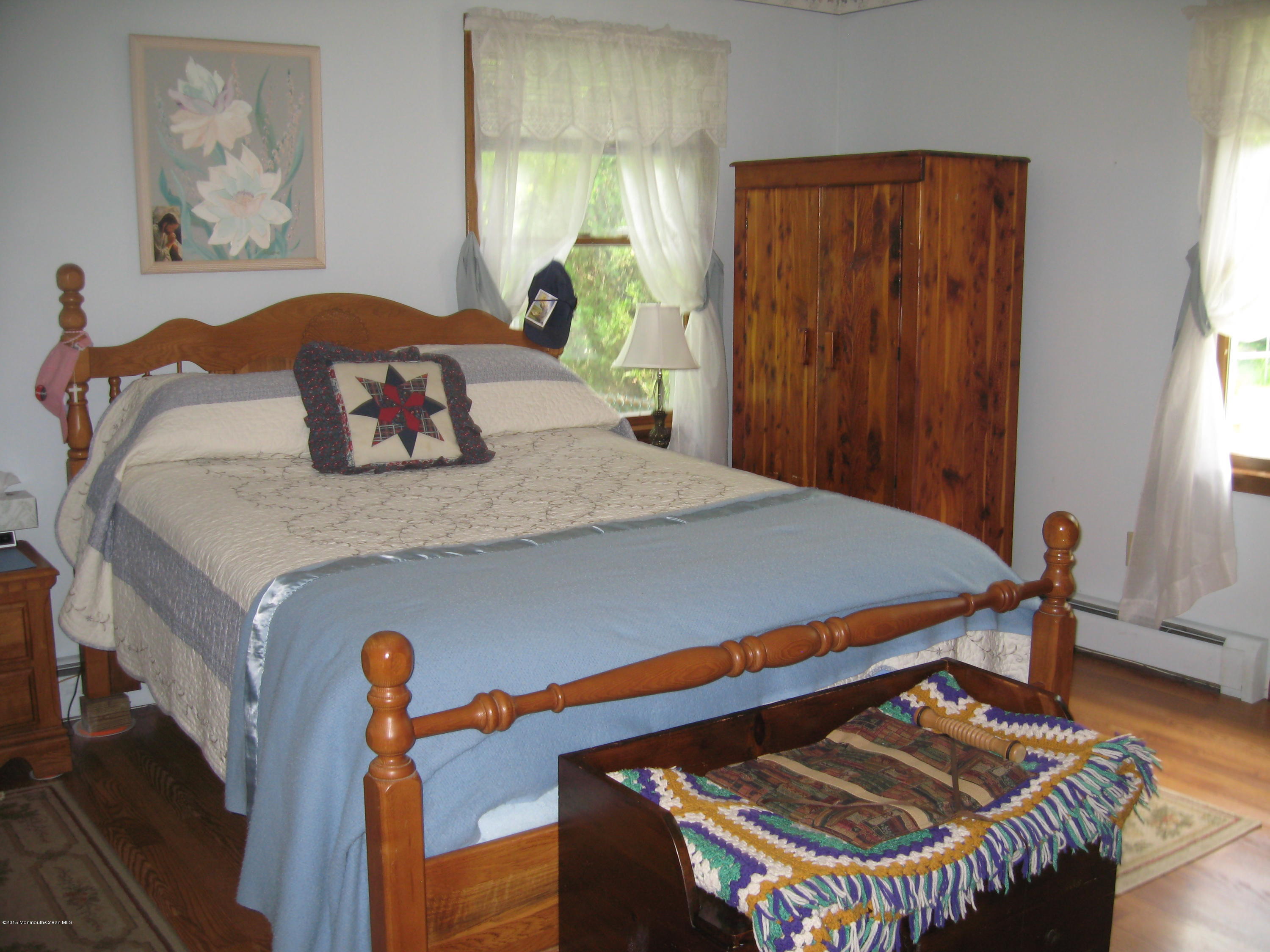 428 Oak Tree Road Freehold, NJ 07728 - Photo 5 of 18 a bedroom with a bed and dresser
