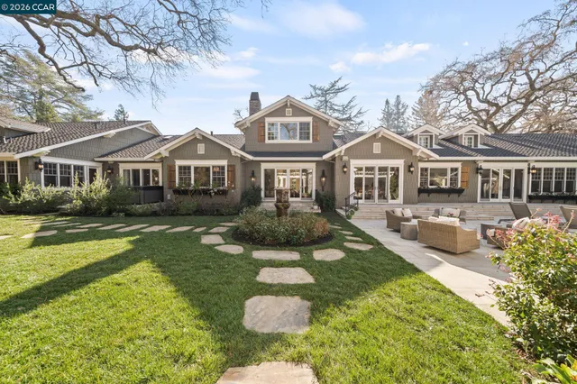 a bathroom with a toilet a sink and a window