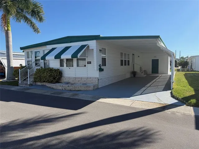 a front view of house with yard