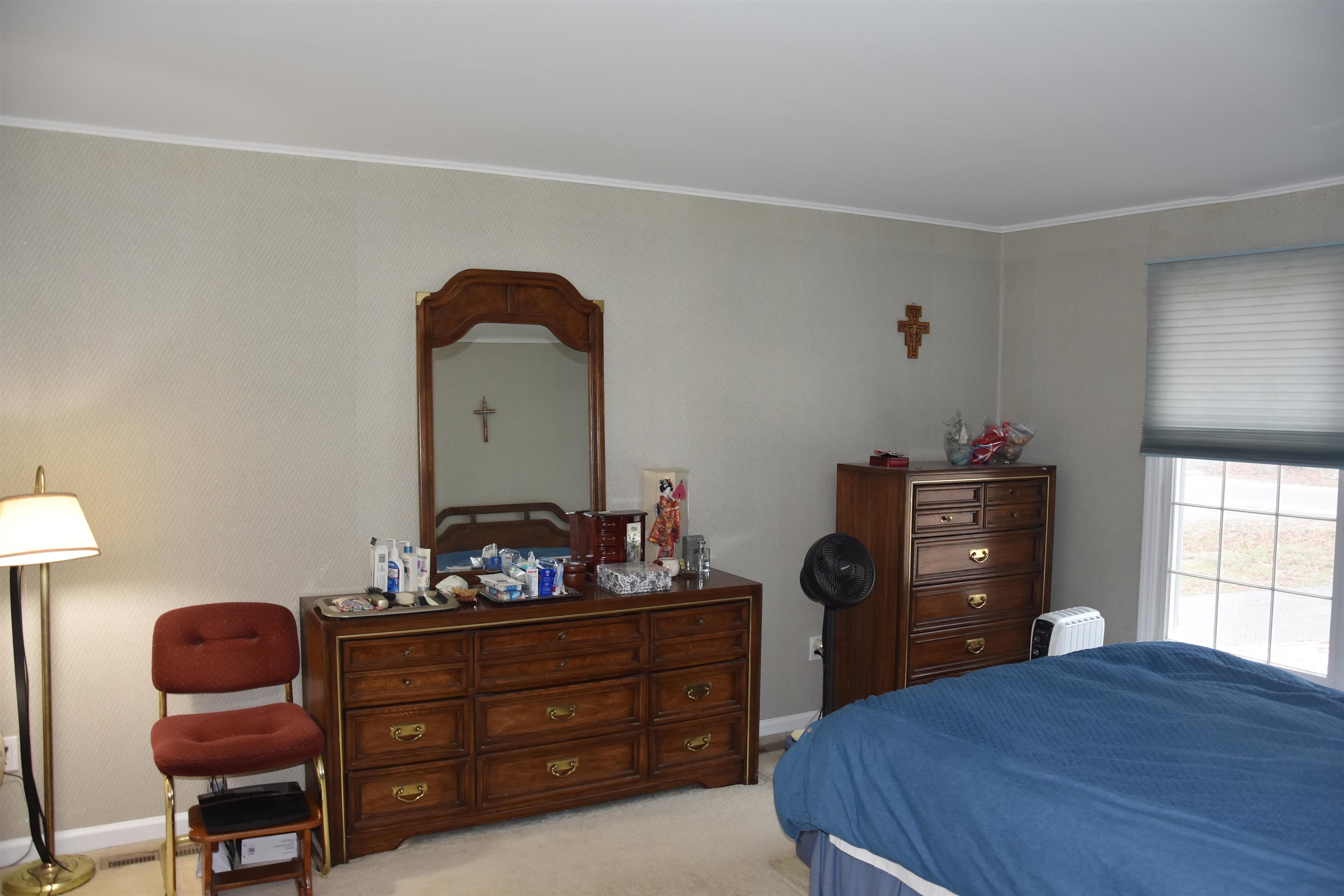 7 Corson Lane Ocean View, NJ 08230 - Photo 20 of 36 a bed room with a bed and a chair