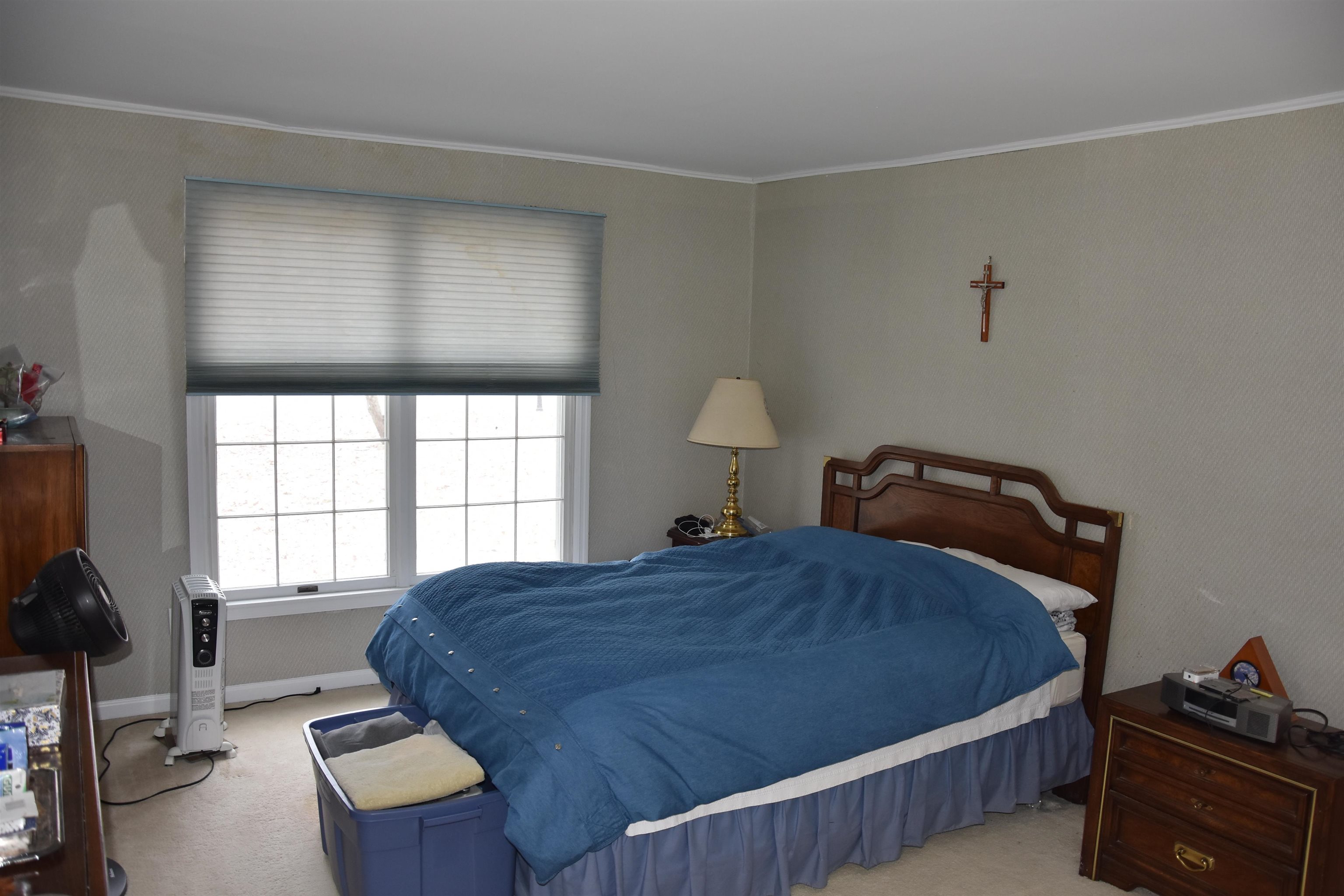 7 Corson Lane Ocean View, NJ 08230 - Photo 21 of 36 a bedroom with a bed and a window