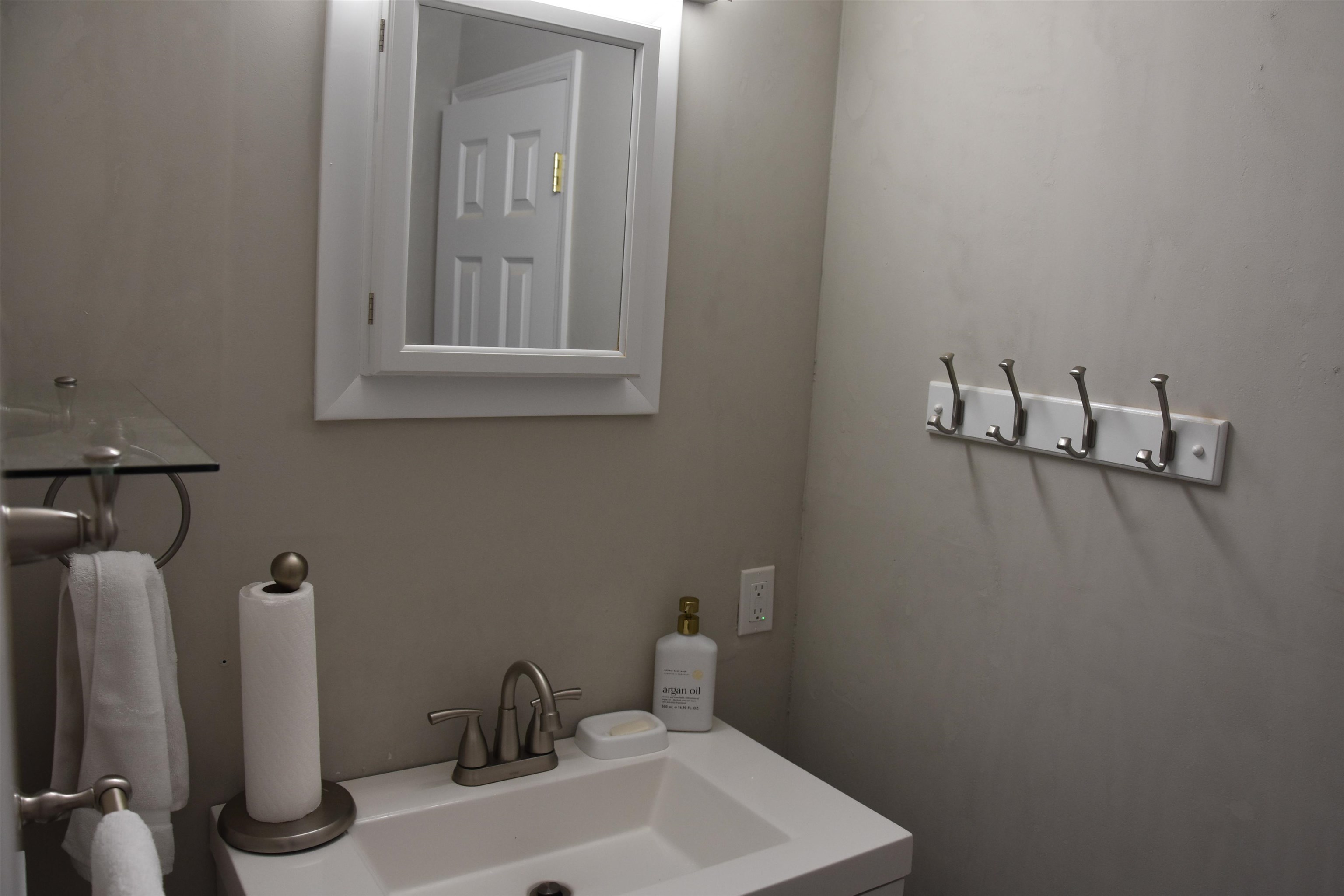 7 Corson Lane Ocean View, NJ 08230 - Photo 22 of 36 a bathroom with a sink and a vanity