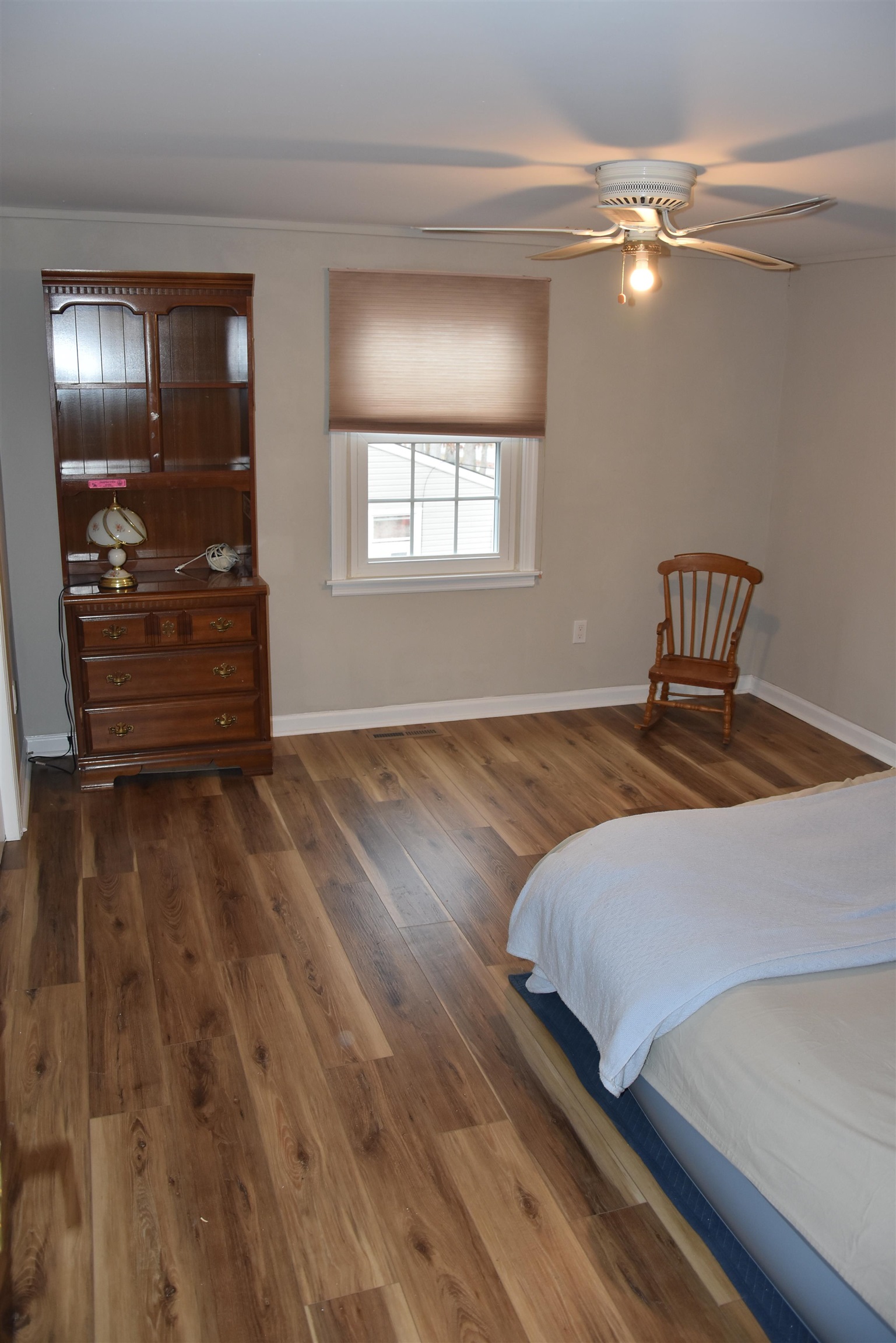 7 Corson Lane Ocean View, NJ 08230 - Photo 26 of 36 a bedroom with a bed and wooden floor