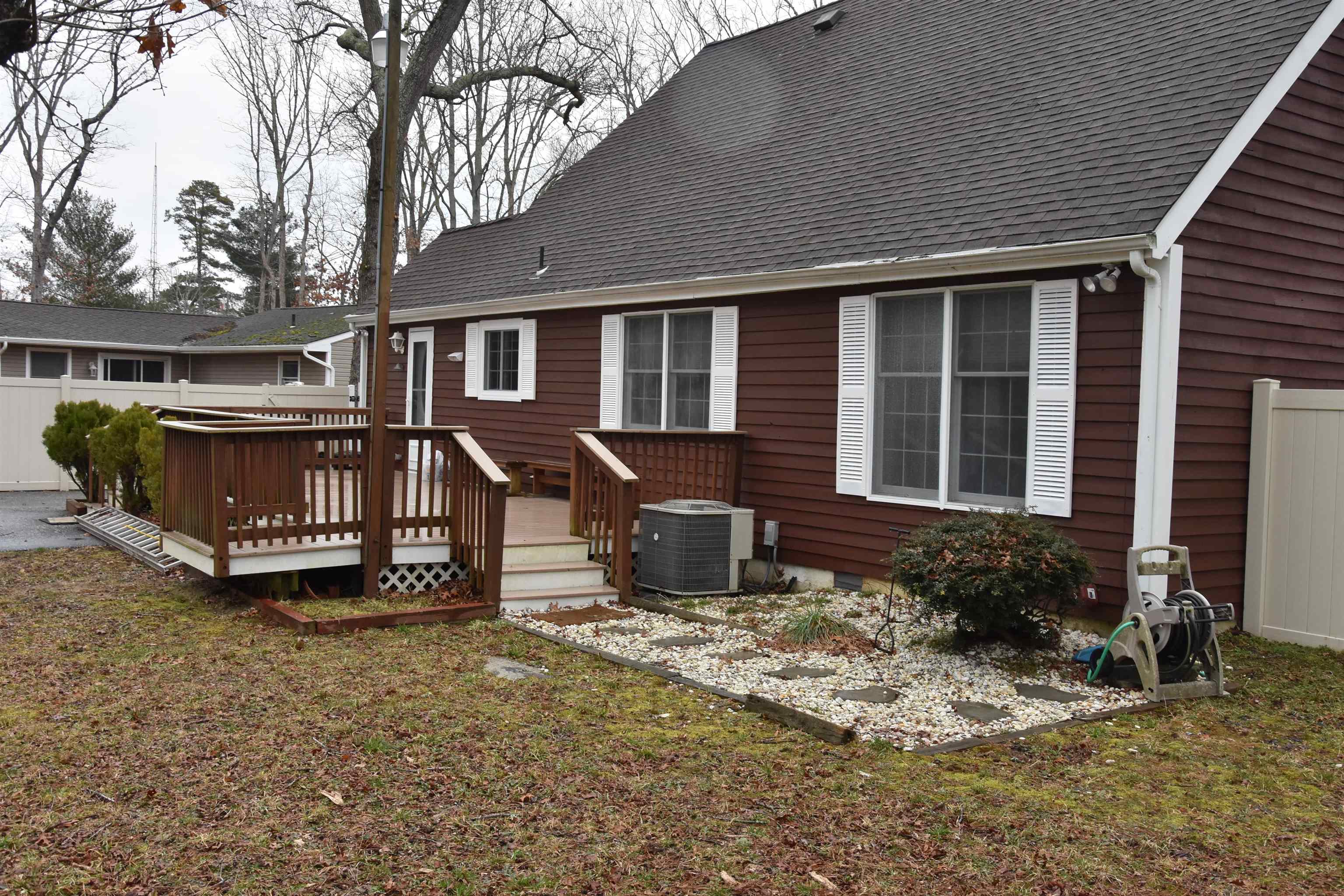 7 Corson Lane Ocean View, NJ 08230 - Photo 5 of 36 a view of a house with a yard and sitting area