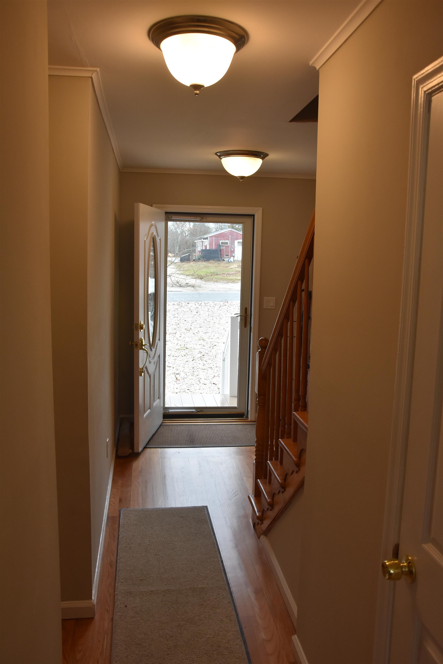 7 Corson Lane Ocean View, NJ 08230 - Photo 9 of 36 a view of a livingroom with a flesh screen tv and stairs